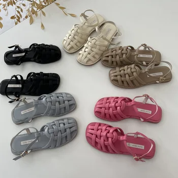 Нови ретро римски сандали дамски плоски увита пръстите куха плажни обувки монах Артистична мода Ins Широки квадратни тъкани дамски сандали